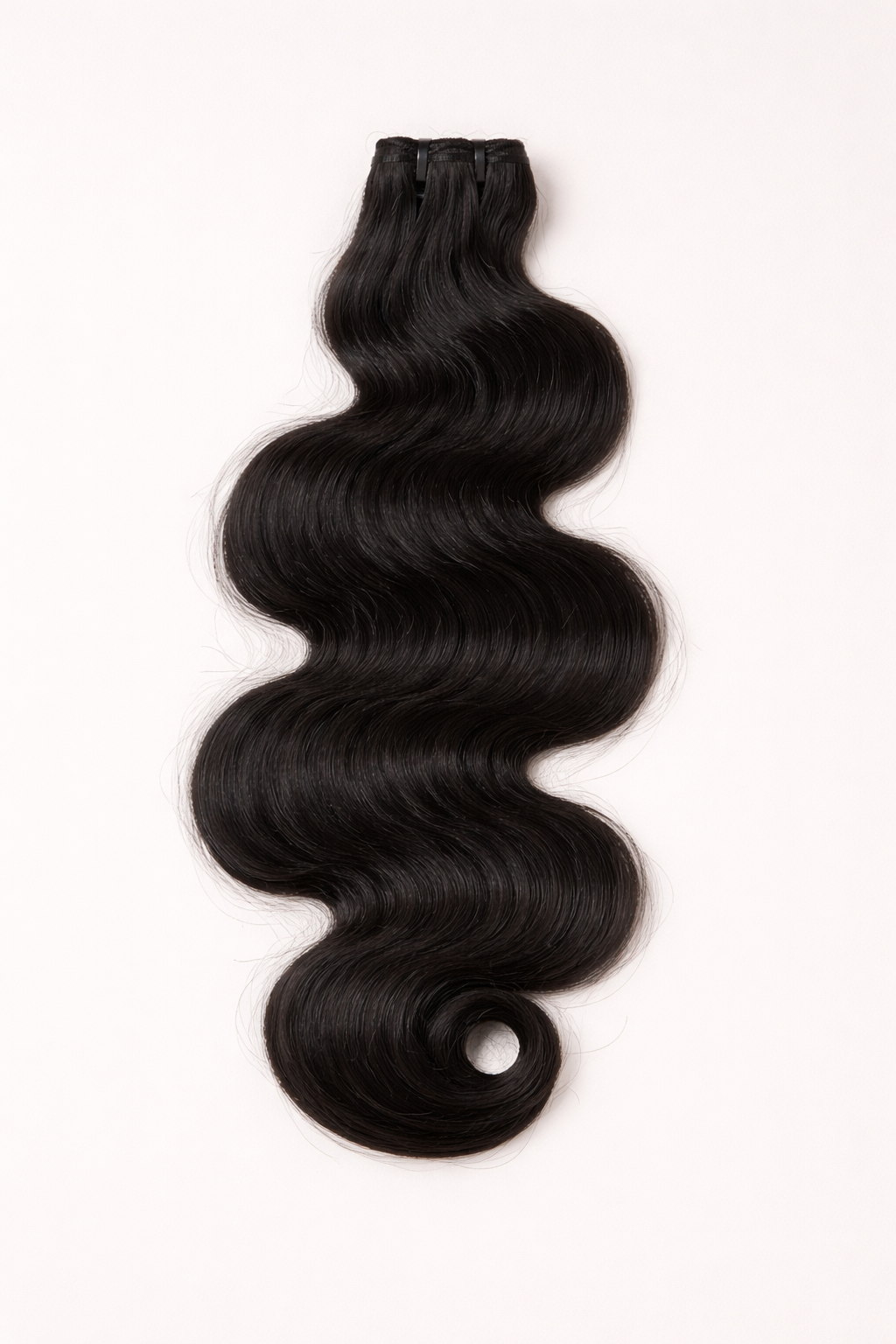 Golvende, onbewerkte haarbundels 